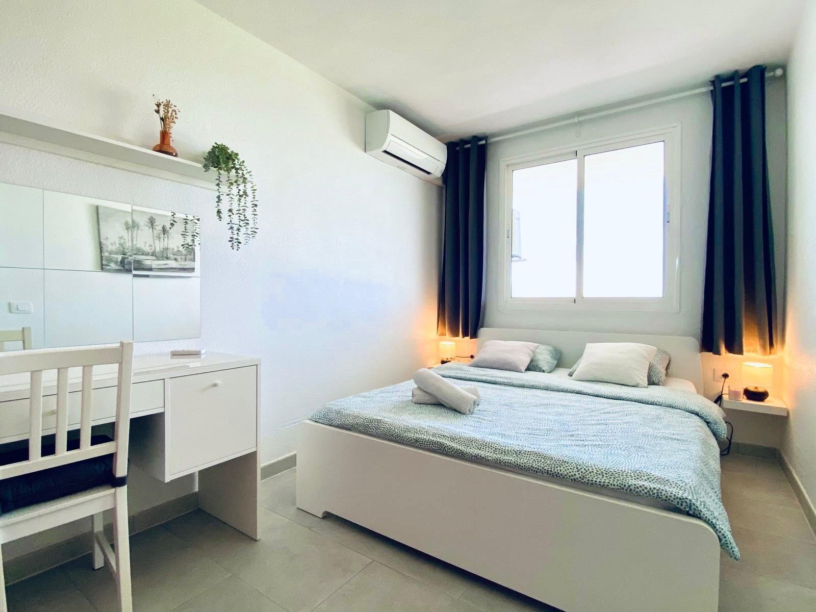 Bajo el sol canario: Apartamento con piscina comunitaria