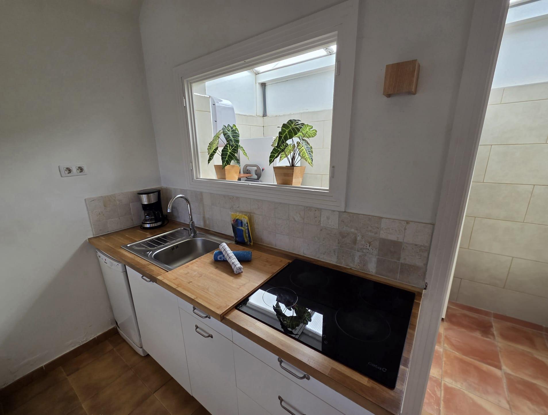 Bungalow de 1 dormitorio con jardín privado en Campo Internacional