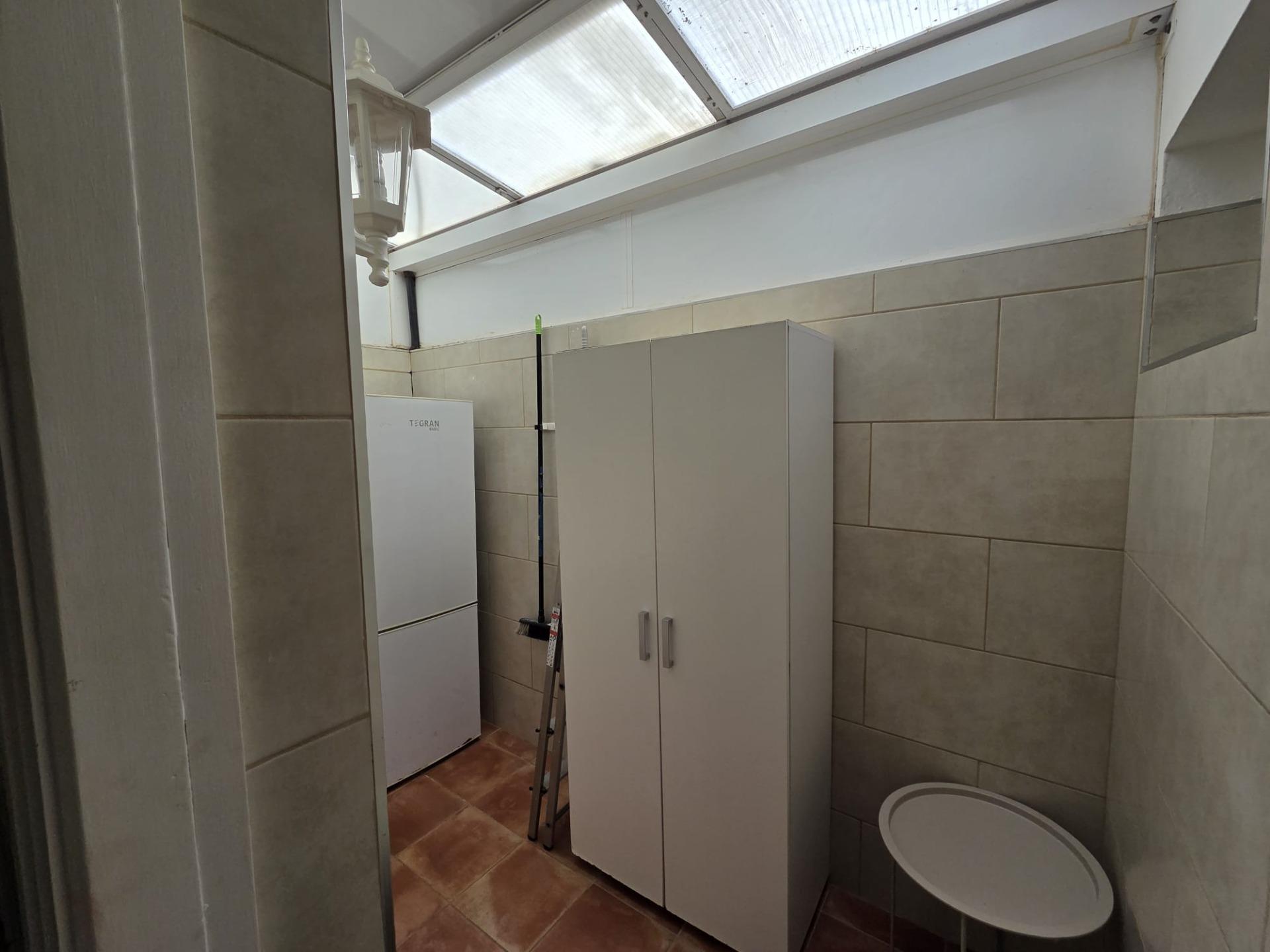 Bungalow de 1 dormitorio con jardín privado en Campo Internacional