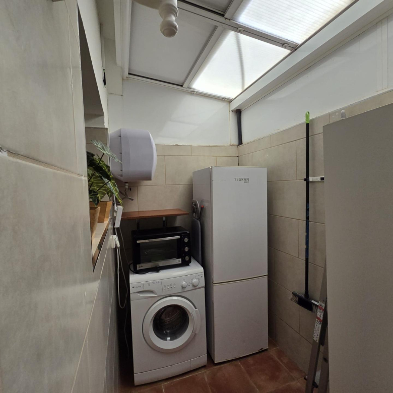 Bungalow de 1 dormitorio con jardín privado en Campo Internacional